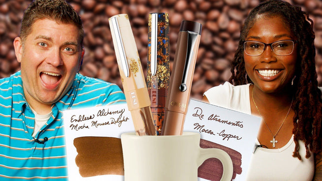 Brian, Janéa, fountain pens in a mug, on a coffee bean background