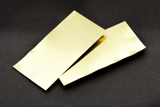 Goulet Brass Sheets on black background