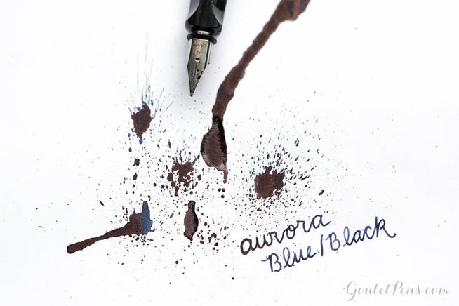 Aurora Blue/Black Fountain pen ink splatter and LAMY AL-star