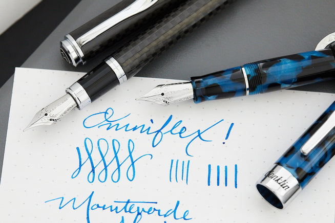 Multiple fountain pens uncapped with JoWo Omniflex nibs