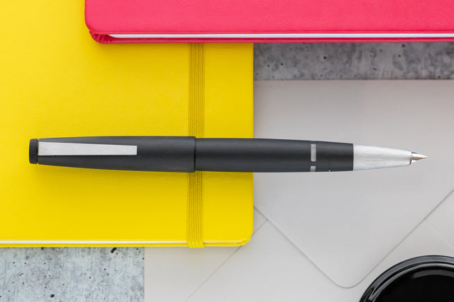 LAMY 2000 uncapped with yellow notebook