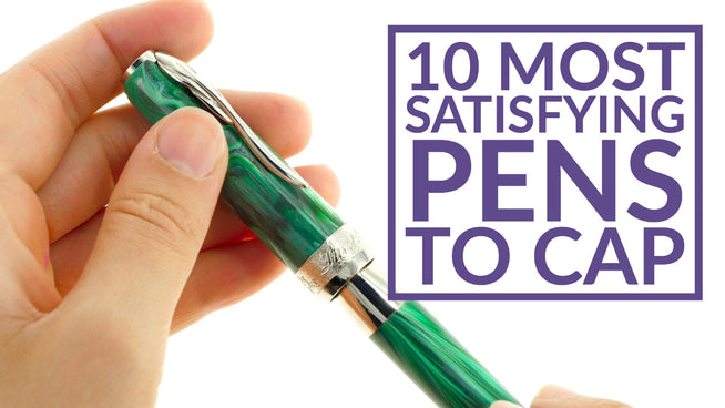 Hand holding a Pineider fountain pen with text 10 most satisfying pens to cap