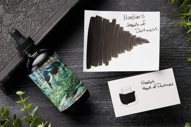 Noodler's Heart of Darkness ink bottle and ink swabs