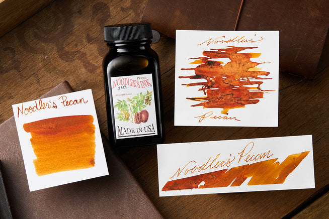 Noodler's Pecan fountain pen ink bottle and 3 swabs.