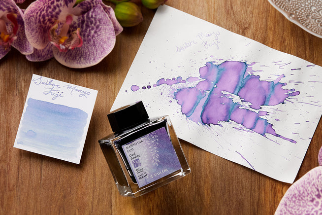 Sailor Manyo Fuji Fountain Pen ink bottle and swab on wooden background