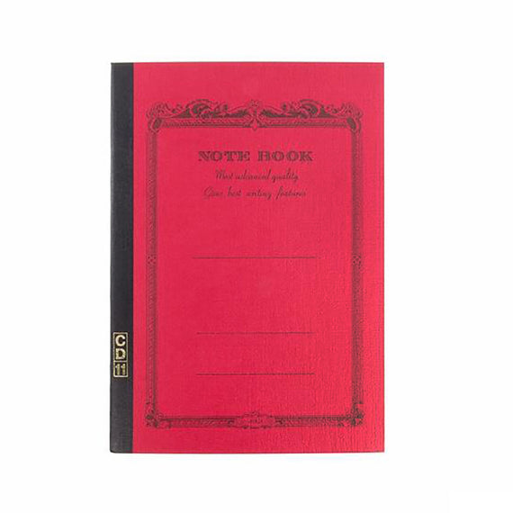 Red notebook on white background
