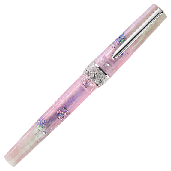 A pink translucent pen filled with iridescent glitter, featuring a silver metal clip and a textured silver band near the cap, shown on a plain white background.