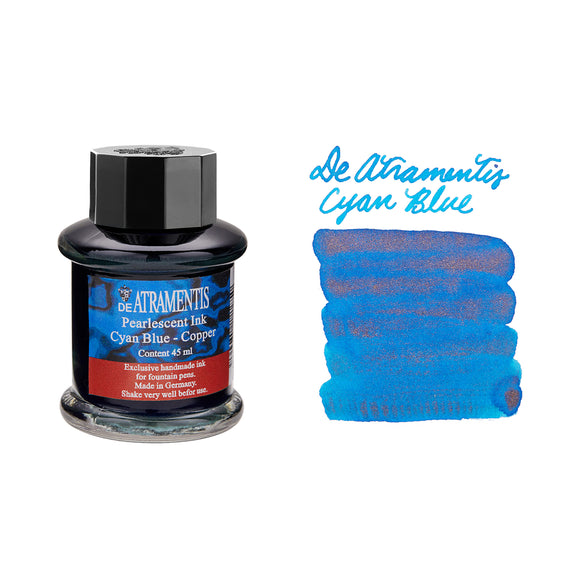 De Atramentis cyan blue ink bottle with swatch on a white background
