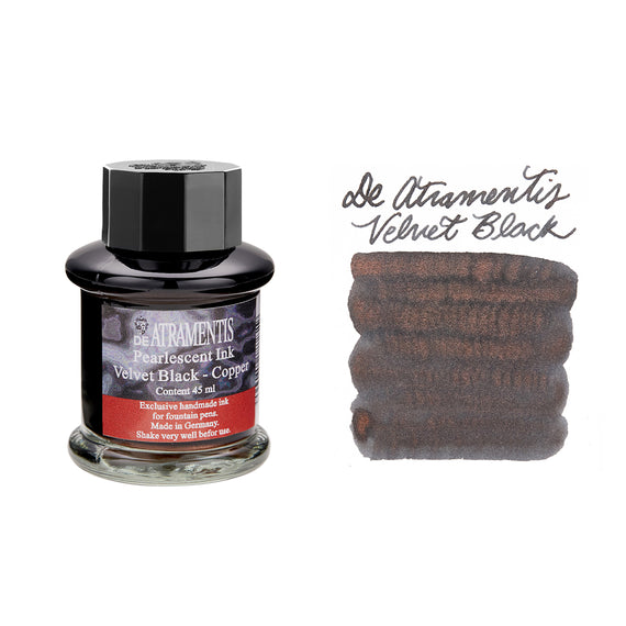 Ink bottle labeled 'De Atramentis Velvet Black' with a sample of ink on a white background