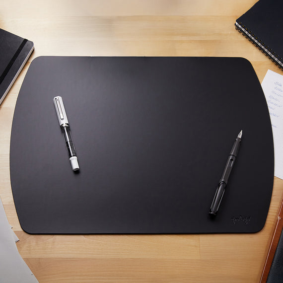Black Girologio Writing Mat for comfortable and stylish desk organization.